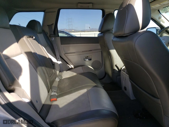 2010 Jeep Grand Cherokee Limited with VIN 1J4RR5GT3AC135686, listed as a Copart auction lot 52961465 with 136,034 mi miles and Salvage Title. Bid and sale history available at carsss.com. Image 11.