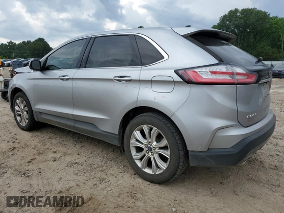 2020 Ford Edge Titanium с VIN 2FMPK4K94LBB35427, выставлен на аукционе Copart как лот 59682805 с пробегом 102 994 миль миль и Списание • Salvage title. История ставок и продаж доступна на DreamBid. Изображение 2.