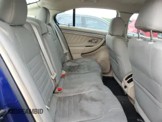 2015 Ford Taurus SE with VIN 1FAHP2D82FG152037, listed as a Copart auction lot 54142515 with 121,427 mi miles and Clean Title. Bid and sale history available at carsss.com. Image 10.