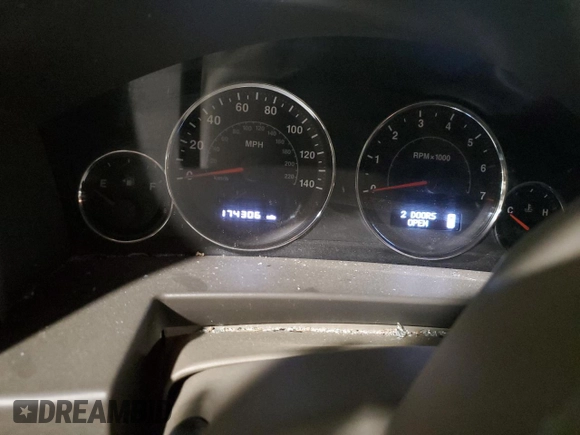 2010 Jeep Commander Sport with VIN 1J4RG4GT7AC113206, listed as a Copart auction lot 56103825 with 174,306 mi miles and Salvage title. Bid and sale history available at DreamBid. Image 9.