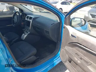 2008 Dodge Caliber SE with VIN 1B3HB28B88D677348, listed as a IAAI auction lot 42130383 with 217,564 mi miles. Bid and sale history available at carsss.com. Image 5.