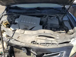 2008 Toyota Camry LE z VIN 4T1BK46KX8U054845, wystawiony jako Copart lot #56856655 z przebiegiem 247 135 mil mil oraz Szkoda całkowita • Salvage title. Historia ofert i sprzedaży dostępna na DreamBid. Obrazek 11.