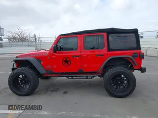 2018 Jeep Wrangler Unlimited Rubicon с VIN 1C4HJXFG4JW156506, выставлен на аукционе IAAI как лот 42246880 с пробегом 57 062 миль миль и . История ставок и продаж доступна на DreamBid. Изображение 14.