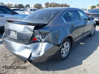 2009 Honda Accord LX-P with VIN JHMCP26459C007437, listed as a IAAI auction lot 41896268 with 221,522 mi miles and . Bid and sale history available at DreamBid. Image 4.