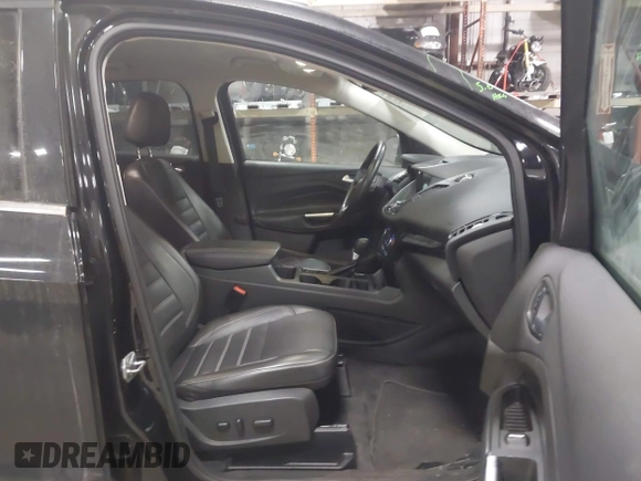 2017 Ford Escape Titanium with VIN 1FMCU9J9XHUB51401, listed as a IAAI auction lot 41025642 with 77,908 mi miles. Bid and sale history available at carsss.com. Image 5.