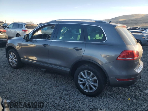 2013 Volkswagen Touareg Lux with VIN WVGEF9BPXDD002285, listed as a Copart auction lot 82248604 with 150,780 mi miles and Salvage Title. Bid and sale history available at DreamBid. Image 2.