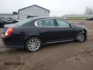 2015 Lincoln MKS with VIN 1LNHL9DK7FG606935, listed as a Copart auction lot 81991384 with 82,097 mi miles and Salvage Title. Bid and sale history available at carsss.com. Image 3.