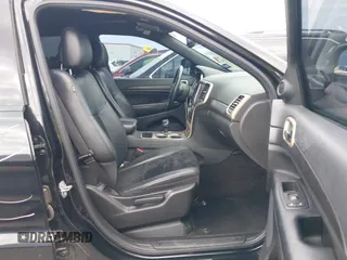 2015 Jeep Grand Cherokee Altitude z VIN 1C4RJFAGXFC659990, wystawiony jako IAAI lot #42331922 z przebiegiem 121 379 mil mil oraz . Historia ofert i sprzedaży dostępna na DreamBid. Obrazek 5.