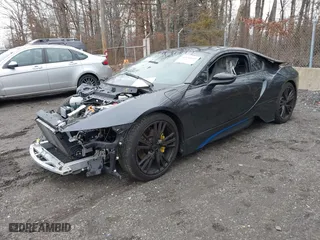 2015 BMW i8 with VIN WBY2Z2C56FVX64947, listed as a IAAI auction lot 41480193 with 51,366 mi miles. Bid and sale history available at carsss.com. Image 2.