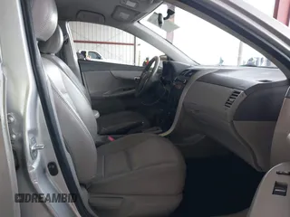 2010 Toyota Corolla with VIN JTDBU4EE2A9107184, listed as a IAAI auction lot 41861299 with 192,519 mi miles. Bid and sale history available at carsss.com. Image 5.