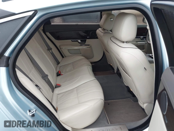 2013 Jaguar XJ with VIN SAJWA2G13DLV57881, listed as a IAAI auction lot 41478667 with 73,764 mi miles. Bid and sale history available at carsss.com. Image 8.