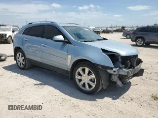 2013 Cadillac SRX Performance Collection with VIN 3GYFNDE37DS535759, listed as a Copart auction lot 52620105 with 92,059 mi miles and Salvage title. Bid and sale history available at DreamBid. Image 4.