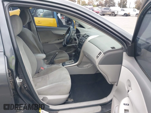 2010 Toyota Corolla with VIN 1NXBU4EE3AZ169217, listed as a IAAI auction lot 42148293 with 205,965 mi miles. Bid and sale history available at carsss.com. Image 5.