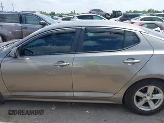 2015 Kia Optima LX with VIN 5XXGM4A71FG423232, listed as a IAAI auction lot 42054131 with 135,213 mi miles. Bid and sale history available at carsss.com. Image 14.