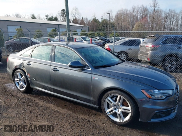 2014 Audi A6 Prestige with VIN WAUHGBFC8EN104920, listed as a IAAI auction lot 41827864 with 70,289 mi miles and . Bid and sale history available at DreamBid. Image 1.