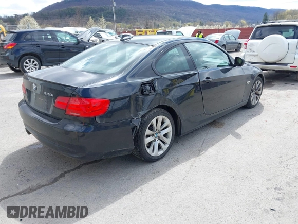 2011 BMW 3 Series 328i xDrive with VIN WBAKF5C55BE586564, listed as a IAAI auction lot 41944192 with 153,167 mi miles. Bid and sale history available at carsss.com. Image 4.