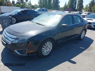 2012 Ford Fusion Hybrid z VIN 3FADP0L3XCR408261, wystawiony jako IAAI lot #42781210 z przebiegiem 281 961 mil mil oraz . Historia ofert i sprzedaży dostępna na DreamBid. Obrazek 2.