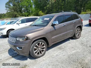 2017 Jeep Grand Cherokee Overland with VIN 1C4RJECG1HC868559, listed as a Copart auction lot 52569595 with 168,226 mi miles and Clean Title. Bid and sale history available at carsss.com. Image 1.