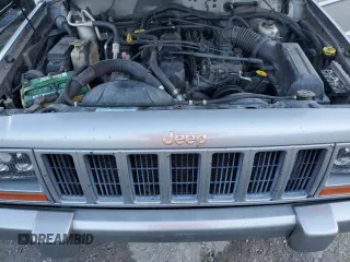 2001 Jeep Cherokee Sport with VIN 1J4FF58S71L576951, listed as a Copart auction lot 78390844 with 267,142 mi miles and Salvage title. Bid and sale history available at DreamBid. Image 12.