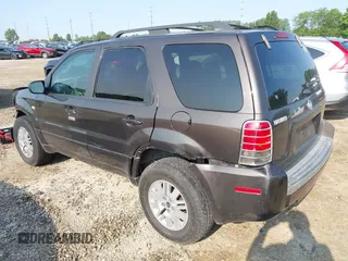 2006 Mercury Mariner Luxury with VIN 4M2YU56196KJ20438, listed as a IAAI auction lot 42394996 with 164,564 mi miles and . Bid and sale history available at DreamBid. Image 3.