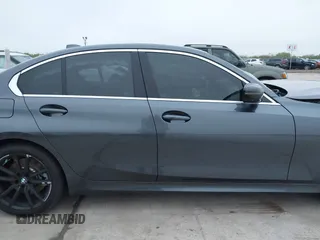 2021 BMW 3 Series 330i with VIN 3MW5R1J09M8C15403, listed as a IAAI auction lot 41892341 with 30,975 mi miles and . Bid and sale history available at carsss.com. Image 13.