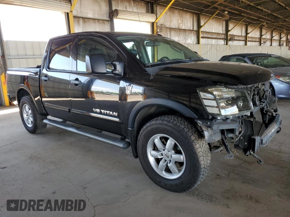 2011 Nissan Titan Pro-4X z VIN 1N6BA0EC9BN304469, wystawiony jako Copart lot #52982815 z przebiegiem 108 829 mil mil oraz Szkoda całkowita • Salvage title. Historia ofert i sprzedaży dostępna na DreamBid. Obrazek 4.
