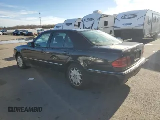 1996 Mercedes-Benz E Class with VIN WDBJF20F9TJ023003, listed as a Copart auction lot 86356784 with 230,944 mi miles and Salvage Title. Bid and sale history available at carsss.com. Image 2.