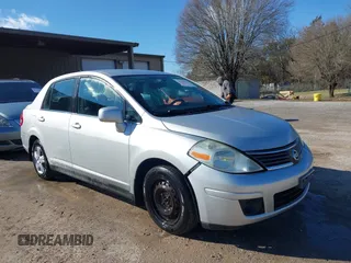 2009 Nissan Versa 1.8 S with VIN 3N1BC11E09L380119, listed as a IAAI auction lot 41742061 with 161,893 mi miles. Bid and sale history available at carsss.com. Image 1.