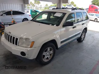 2005 Jeep Grand Cherokee Laredo with VIN 1J4GR48K25C599307, listed as a IAAI auction lot 42705166 with 231,747 mi miles and . Bid and sale history available at DreamBid. Image 2.