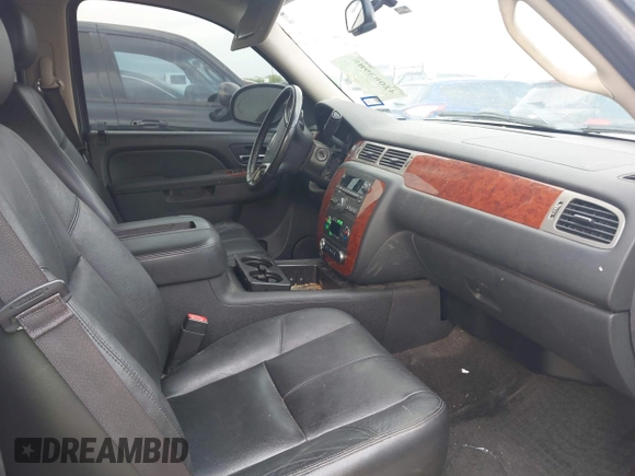 2013 Chevrolet Suburban LT with VIN 1GNSCJE03DR164477, listed as a IAAI auction lot 42083985 with 150,540 mi miles and . Bid and sale history available at DreamBid. Image 5.