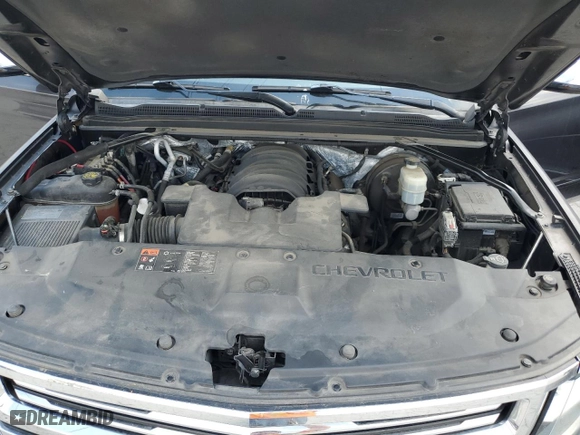 2015 Chevrolet Suburban LTZ with VIN 1GNSCKKCXFR216890, listed as a Copart auction lot 52695155 with 233,296 mi miles and Clean Title. Bid and sale history available at carsss.com. Image 12.