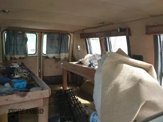 1983 Chevrolet Chevy Van z VIN 2GBEG25H9D4158345, wystawiony jako IAAI lot #41936449 z przebiegiem 17 406 mil mil oraz . Historia ofert i sprzedaży dostępna na DreamBid. Obrazek 8.