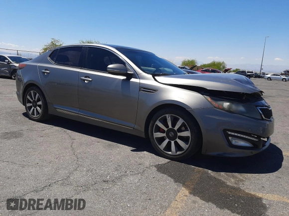 2012 Kia Optima SX z VIN 5XXGR4A60CG044520, wystawiony jako Copart lot #56013155 z przebiegiem 155 487 mil mil oraz Szkoda całkowita • Salvage title. Historia ofert i sprzedaży dostępna na DreamBid. Obrazek 4.