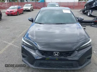 2023 Honda Civic Sport with VIN 19XFL2H82PE021151, listed as a IAAI auction lot 41943345 with 55,679 mi miles and . Bid and sale history available at DreamBid. Image 13.