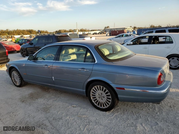 2005 Jaguar XJ VDP with VIN SAJWA82C65SG45247, listed as a Copart auction lot 77950594 with NaN miles and Salvage Title. Bid and sale history available at carsss.com. Image 2.