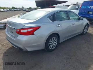 2016 Nissan Altima SR with VIN 1N4AL3AP4GC201259, listed as a IAAI auction lot 42173893 with 129,866 mi miles and . Bid and sale history available at carsss.com. Image 4.
