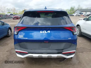 2025 Kia Sportage EX z VIN 5XYK3CDFXSG273654, wystawiony jako IAAI lot #42167635 z przebiegiem 6345 mil mil oraz . Historia ofert i sprzedaży dostępna na DreamBid. Obrazek 17.