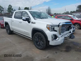 2020 GMC Sierra 1500 Denali z VIN 3GTU9FELXLG371258, wystawiony jako IAAI lot #41303490 z przebiegiem 63 571 mil mil oraz . Historia ofert i sprzedaży dostępna na DreamBid. Obrazek 1.