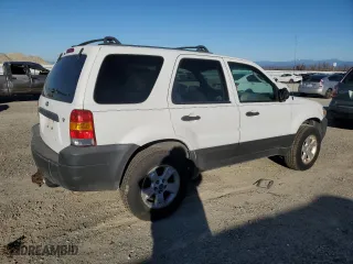 2005 Ford Escape XLT with VIN 1FMYU93115KD39938, listed as a Copart auction lot 88794455 with 133,562 mi miles and Salvage Title. Bid and sale history available at carsss.com. Image 3.
