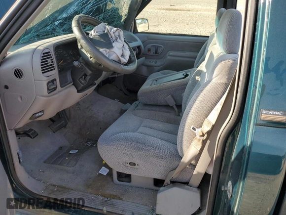 1996 Chevrolet Silverado 1500 with VIN 1GCEC14M6TZ154941, listed as a Copart auction lot 66361154 with 124,631 mi miles and Salvage Title. Bid and sale history available at DreamBid. Image 7.