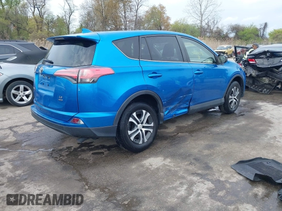 2018 Toyota RAV4 LE with VIN JTMBFREV8JJ220630, listed as a IAAI auction lot 42001795 with 86,027 mi miles. Bid and sale history available at carsss.com. Image 4.
