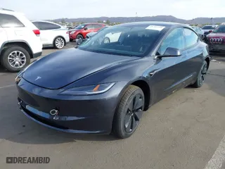 2025 Tesla Model 3 Long Range with VIN 5YJ3E1EA4SF914133, listed as a IAAI auction lot 41706994 with 1,932 mi miles. Bid and sale history available at carsss.com. Image 2.