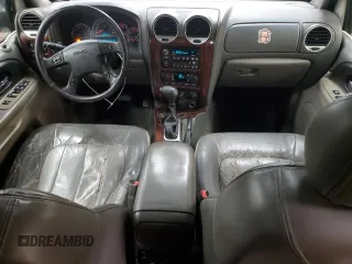 2003 GMC Envoy SLT с VIN 1GKET16S736148082, выставлен на аукционе Copart как лот 53889665 с пробегом 179 774 миль миль и Чистый • Clean title. История ставок и продаж доступна на DreamBid. Изображение 8.