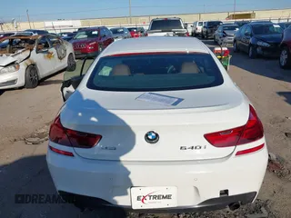 2015 BMW 6 Series 640i xDrive with VIN WBA6B8C50FD453317, listed as a IAAI auction lot 41635430 with 77,811 mi miles and . Bid and sale history available at DreamBid. Image 16.