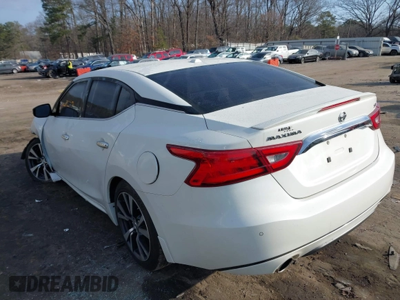 2016 Nissan Maxima SL with VIN 1N4AA6AP2GC387004, listed as a IAAI auction lot 41504524 with 95,437 mi miles and . Bid and sale history available at DreamBid. Image 3.