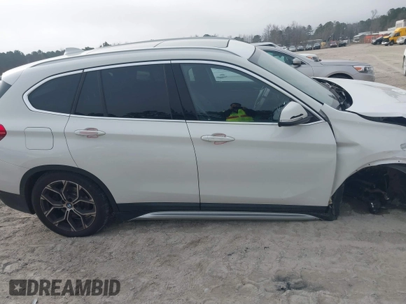 2022 BMW X1 xDrive28i z VIN WBXJG9C0XN5U89973, wystawiony jako IAAI lot #41508343 z przebiegiem 67 424 mil mil oraz . Historia ofert i sprzedaży dostępna na DreamBid. Obrazek 13.