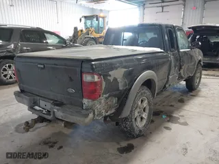 2003 Ford Ranger XL Fleet with VIN 1FTZR45EX3PA60520, listed as a IAAI auction lot 41591797 with 205,040 mi miles. Bid and sale history available at carsss.com. Image 4.