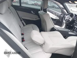 2014 Mercedes-Benz E 550 Sport with VIN WDDHF9BBXEA940995, listed as a IAAI auction lot 41872452 with 50,451 mi miles and . Bid and sale history available at DreamBid. Image 8.