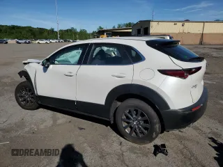 2023 Mazda CX-30 S with VIN 3MVDMBAM0PM506565, listed as a Copart auction lot 57699125 with 7,345 mi miles and Salvage title. Bid and sale history available at DreamBid. Image 2.
