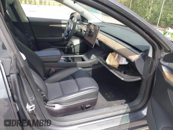 2023 Tesla Model 3 z VIN 5YJ3E1EA4PF461624, wystawiony jako IAAI lot #42433789 z przebiegiem 22 182 mil mil oraz . Historia ofert i sprzedaży dostępna na DreamBid. Obrazek 5.